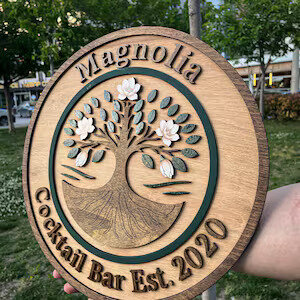 Plaque ronde avec logo gravé